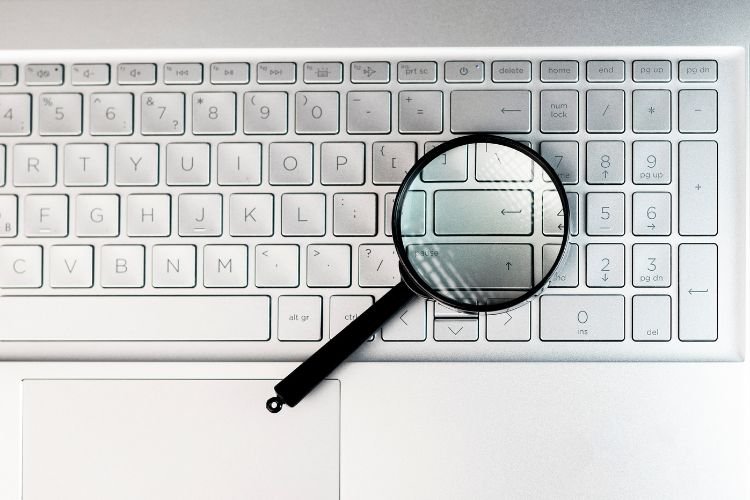 Laptops Keyboard through magnifying glass